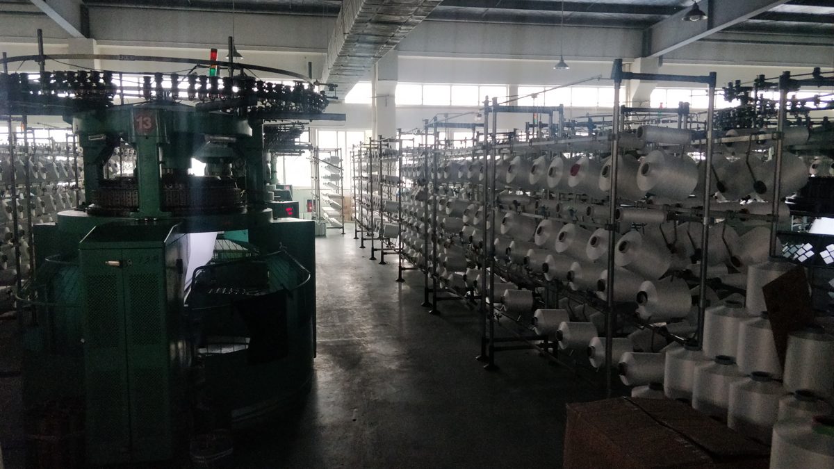Machineries import - knitting machines in a Chinese factory